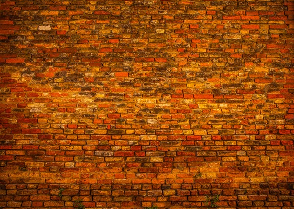 Mur z cegły starożytnej jako tło. — Zdjęcie stockowe