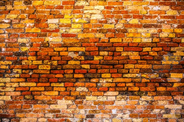 Oude bakstenen muur als achtergrond. — Stockfoto