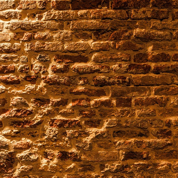 Antigua pared de ladrillo como fondo . — Foto de Stock