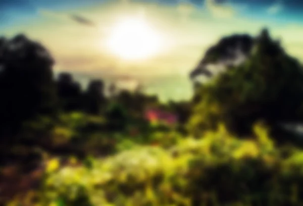 Beautiful blurred tropical view in defocus. Landscape photo with rocks and sea. — Stock Photo, Image