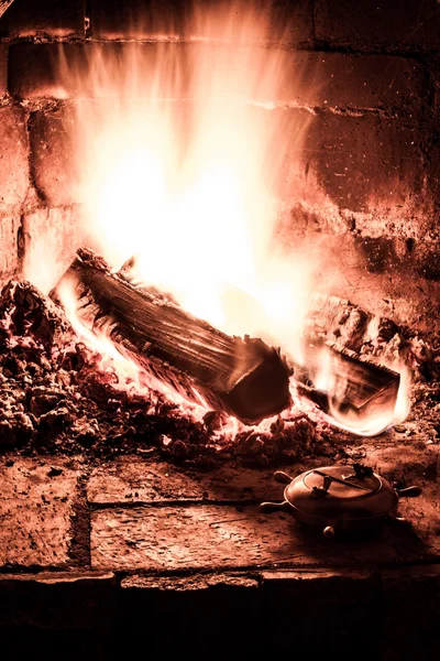 Fireplace with a blazing fire. Photo. — Stock Photo, Image