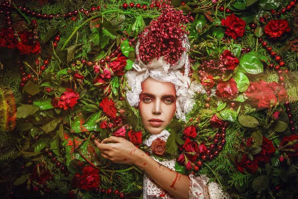 Fairy tale woman portrait surrounded with natural plants and roses. Art image in bright fantasy stylization. — Stok fotoğraf