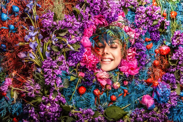 Fairy tale girl portrait surrounded with natural plants and flowers. Art image in bright fantasy stylization. — Stock Photo, Image