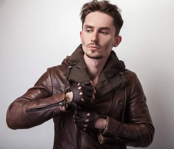 Attractive young man in leather jacket — Stock Photo, Image