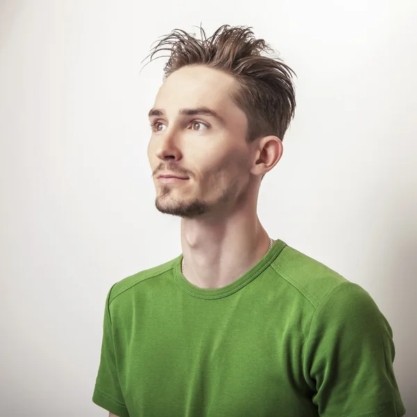 Handsome man in green t-shirt. — Stock Photo, Image