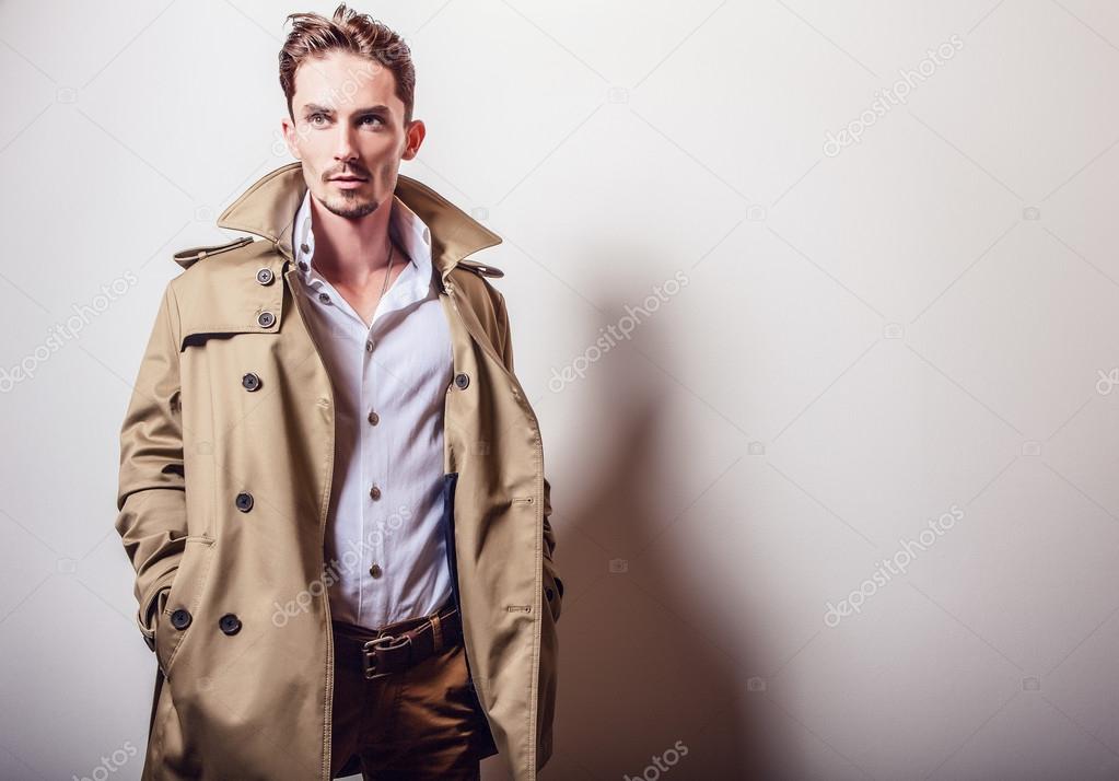 Elegant man in long stylish coat