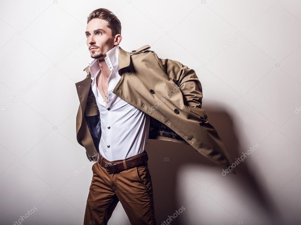 Elegant man in long stylish coat