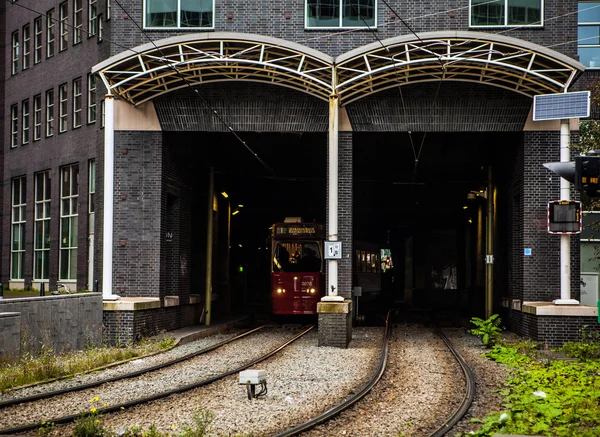 Tram leaving tunnel — Stock Photo, Image