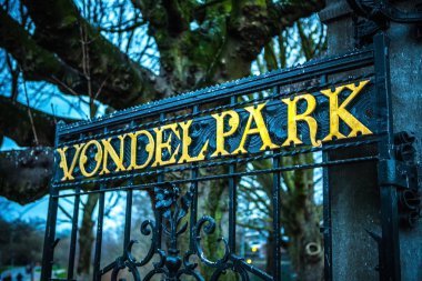 AMSTERDAM, NETHERLANDS - JANUARY 1, 2016: Entrance of Vondel park in Amsterdam, letters on fence. Amsterdam - Netherland.