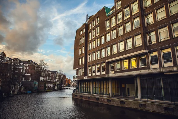 General landscape views from city brige in channels & residential buildings of Amsterdam — Stock Fotó