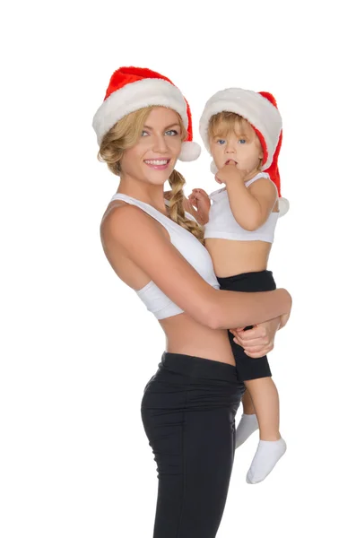 Beautiful family clothing for fitness and  hats — Stock Photo, Image