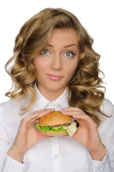 Mujer joven sorprendida con hamburguesa — Foto de Stock