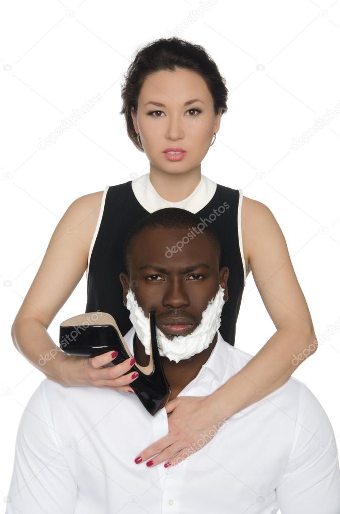 Asian woman shave dark-skinned men heel shoes