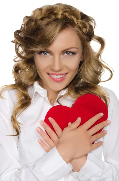 Smiling woman pushes heart to himself — Stock Photo, Image