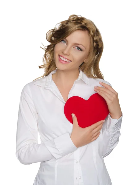 Young blonde pushes heart to himself — Stock Photo, Image