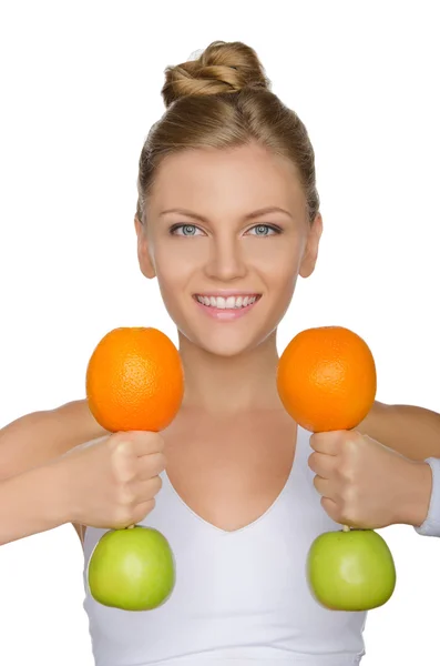 Beautiful woman with dumbbells from fruits — Stock Photo, Image