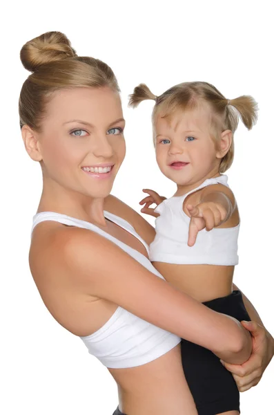 Mother with her daughter in yoga clothes — Stock Photo, Image