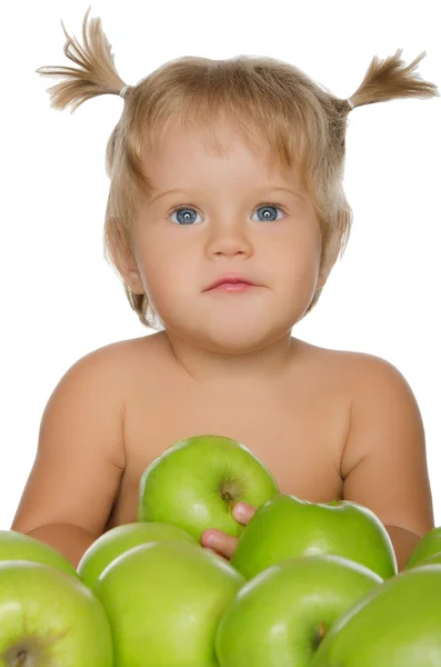 Little beautiful girl with green apples — Stock Photo, Image