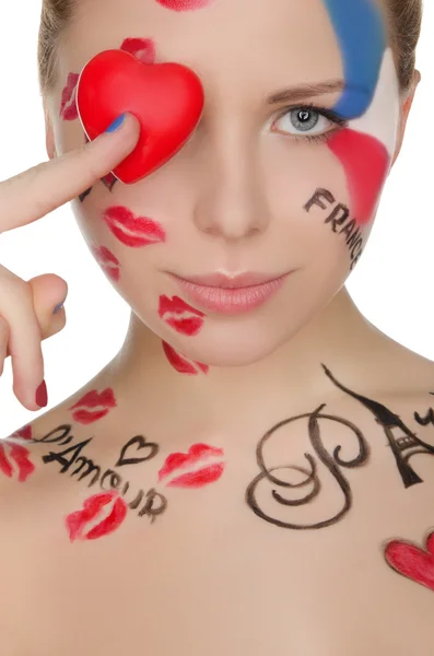 Happy woman with face art on theme of France — Stock Photo, Image