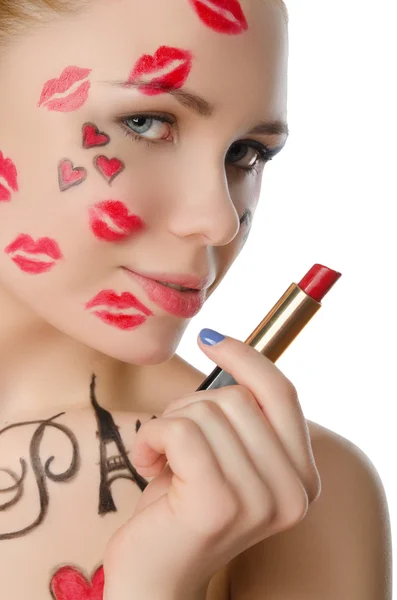 Charming woman with face art on theme of Paris — Stockfoto