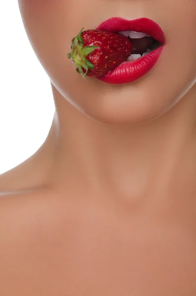 Sexy female lips with strawberries — Stockfoto