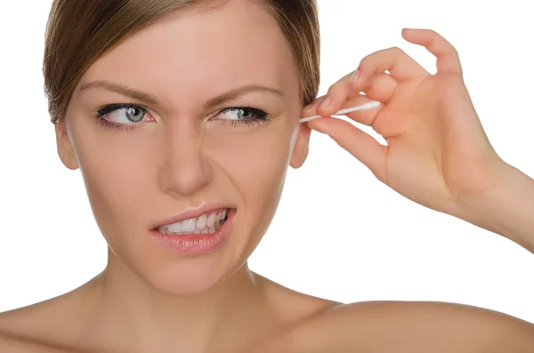 Woman injured cleans ears with cotton sticks — Stock Photo, Image