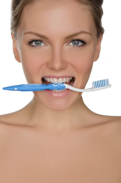 Portrait beautiful woman with toothbrush in teeth — Stock fotografie