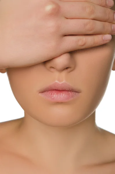 Woman shields her eyes from hand — Stock Photo, Image