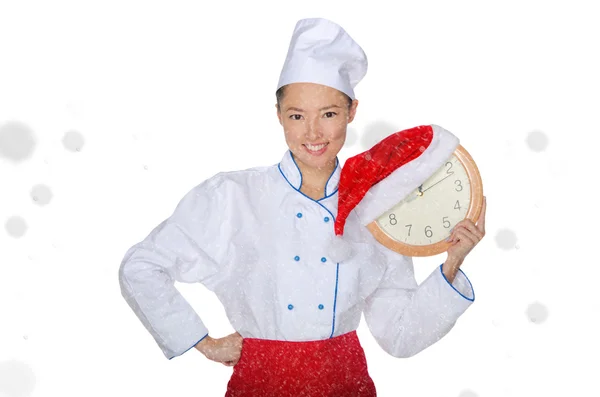 Asian chef with clock and Christmas hat — Stock Photo, Image