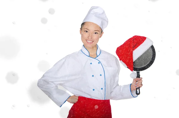 Happy asian chef with frying pan and Christmas hat — Stock Photo, Image