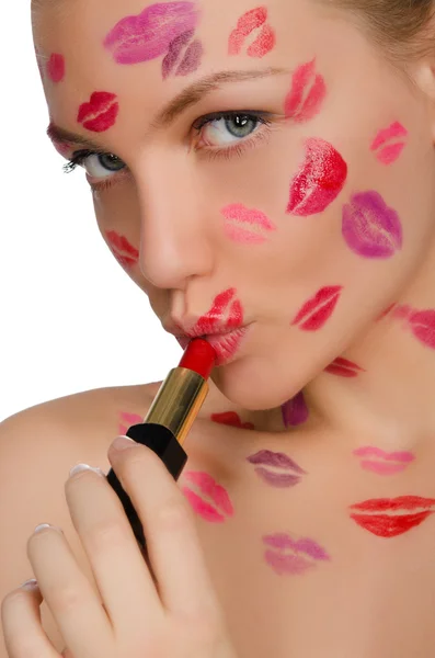 Woman with kisses on face in lipstick and lips — Stock Photo, Image