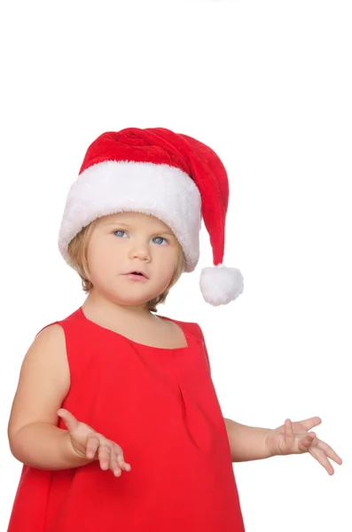 Surprised little girl in christmas cap — Stock Photo, Image
