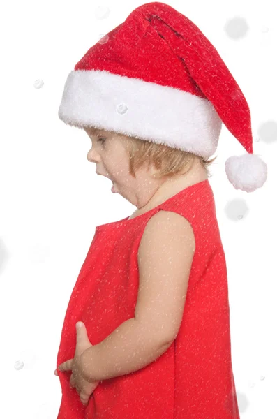 Surprised child in christmas cap, snow — Stock Photo, Image