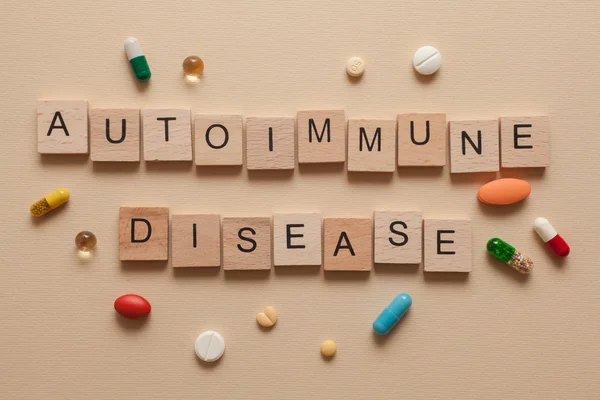 Autoimmune disease with pills — Stock Photo, Image