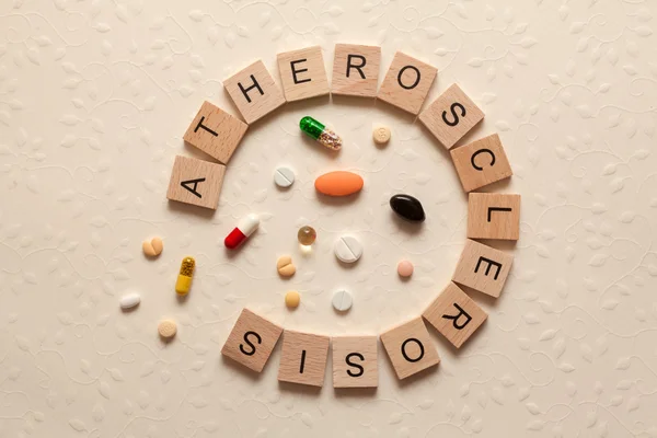 Atherosclerosis with pills — Stock Photo, Image