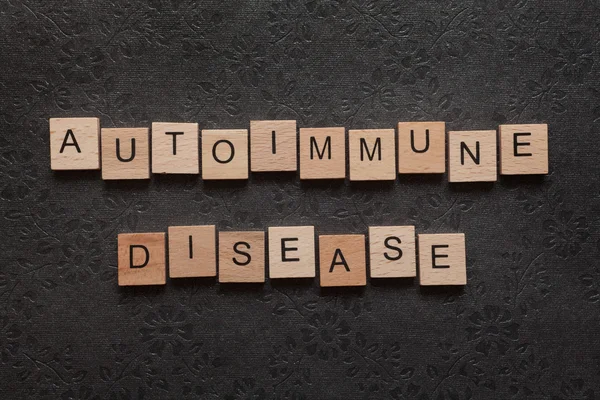 Autoimmune disease on black — Stock Photo, Image