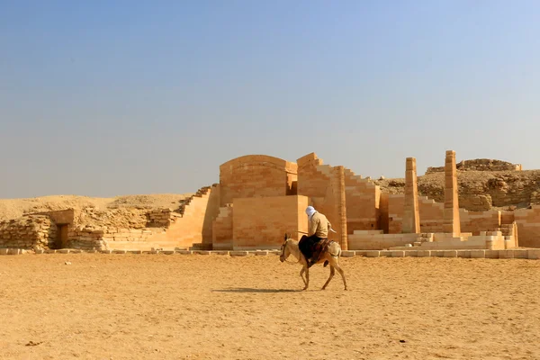 Egyptian man on donkey back  at Saqqara — Stock Photo, Image