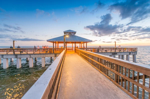 Beautiful pier at sunset — Stock Photo, Image