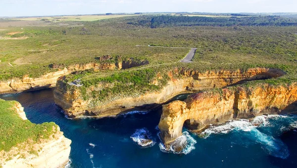 Loch Ard Gorge and Arch Island on the Great Ocean Road, aerial v — Stock Photo, Image