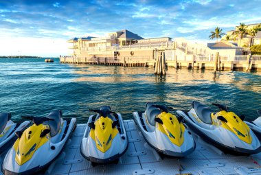 Jet skis and buildings of Key West clipart