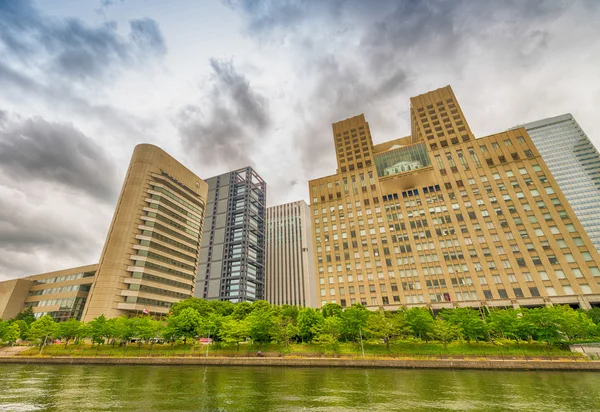 Osaka skyscrapers over the river — Stock Photo, Image