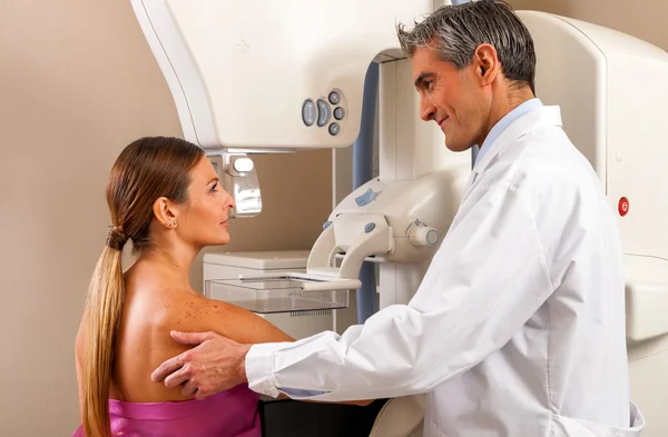 Woman in 40s about to undergoing a mammography test in hospital — Stock Photo, Image