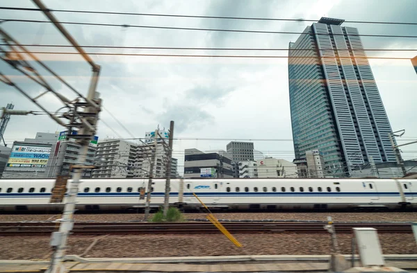 Ναγκόγια, Ιαπωνία - 25 Μαΐου: Τραίνο σφαιρών Shinkansen επιταχύνει σε Nag — Φωτογραφία Αρχείου