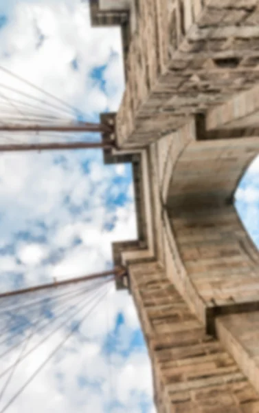 Blurred view of old Brooklyn Bridge pylons — Stock Photo, Image