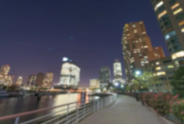 Defocused night view of New York City and Hudson river — Stock Photo, Image
