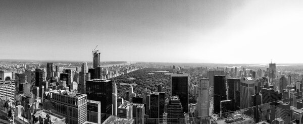 NEW YORK CITY - JUNE 2013: Panoramic view of Manhattan on a beautiful day. New York attracts 50 million visitors every year.