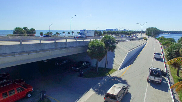 Vehicles travel along the Rickenbacker Causeway in Miami