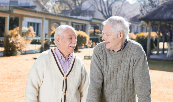 Happiness in elder rehab facility. Retired successful people