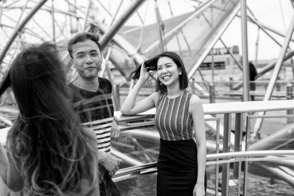 Three Young Asian Friends Outdoor Standing Talking Enjoying City Life — Stock Photo, Image