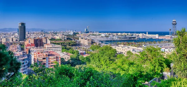 BARCELONA, SPAIN - MAY 11, 2018: Aerial view of city slyline from Montjuic on a sunny day